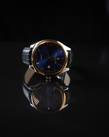 HIGH END BLUE SUNBURST DIAL WITH ELLIPTICAL CASE & BLACK LEATHER STRAP