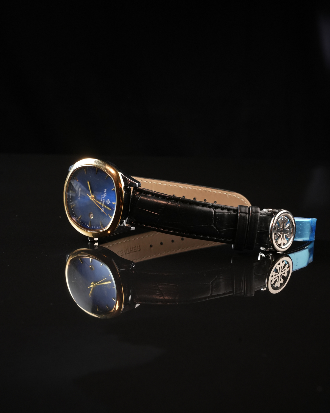 HIGH END BLUE SUNBURST DIAL WITH ELLIPTICAL CASE & BLACK LEATHER STRAP